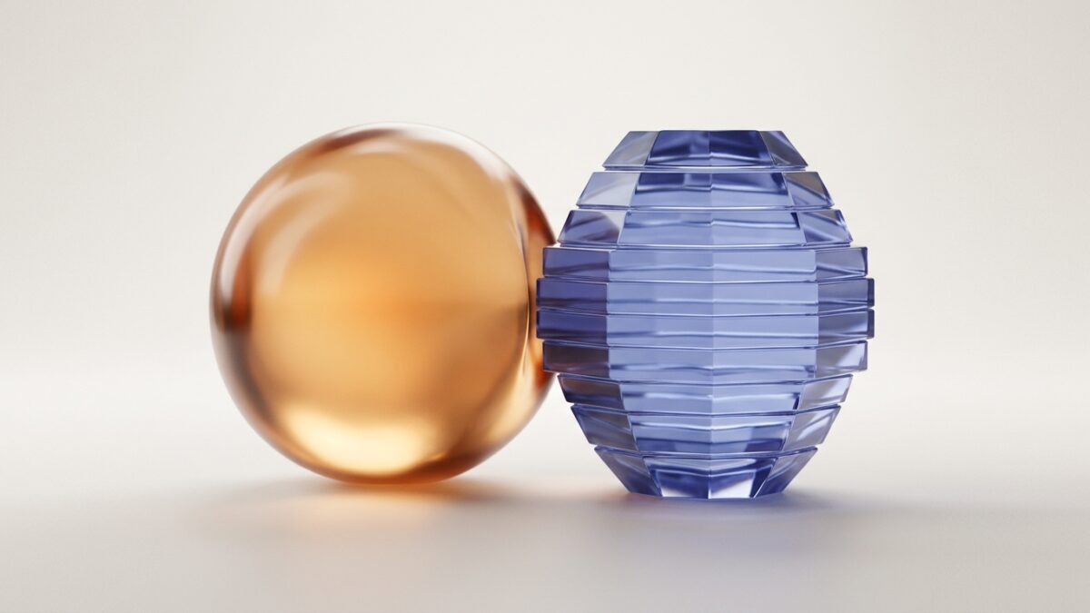 Abstract editorial render: a smooth warm-amber sphere beside a cool-blue layered crystal, representing two contrasting AI memory architectures